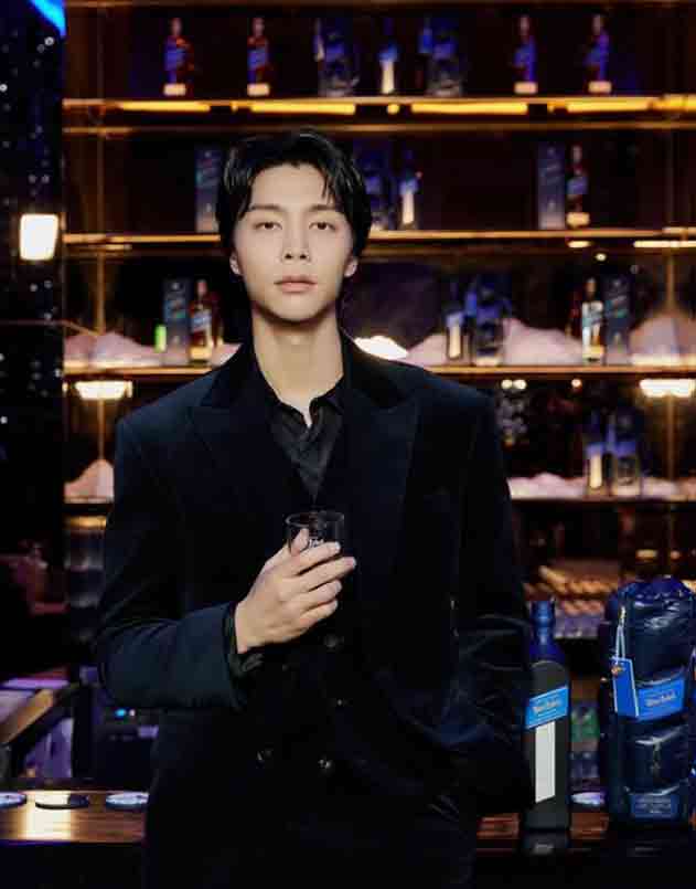 13 ídolos masculinos más altos del K-pop 14 Johnny (NCT 127)